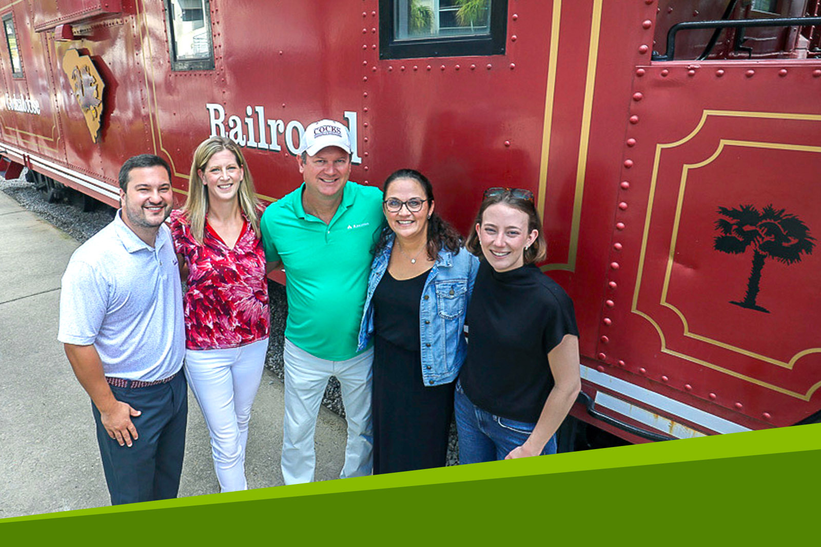 Group of Regions associates standing together in front of a...