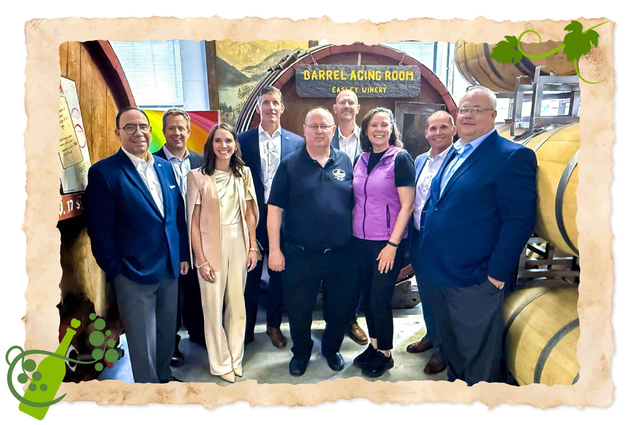 Regions Bank associates and Easley Winery owners in barrel aging...