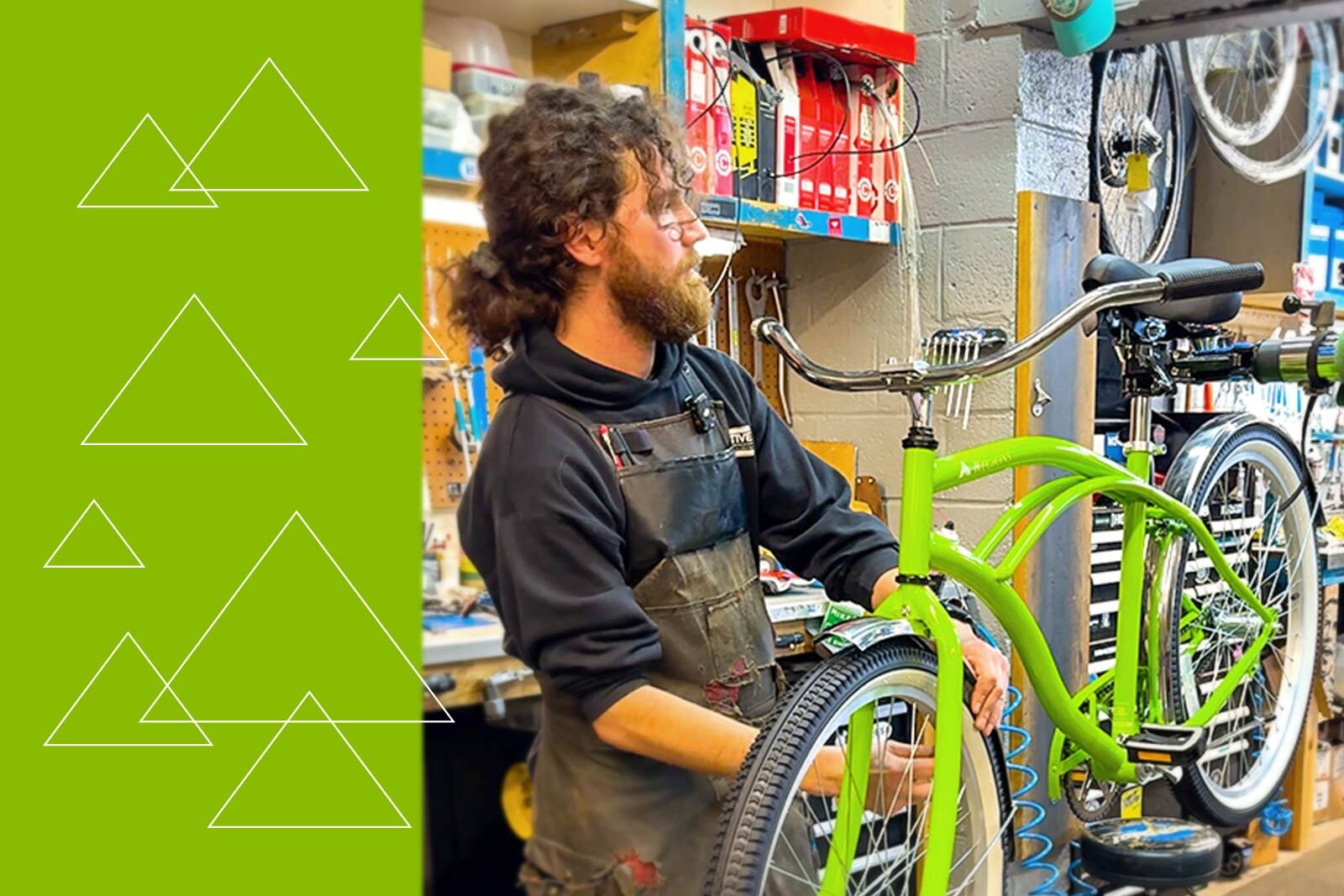 Taylor, head mechanic at Redemptive Cycles, assembles a Regions bike.