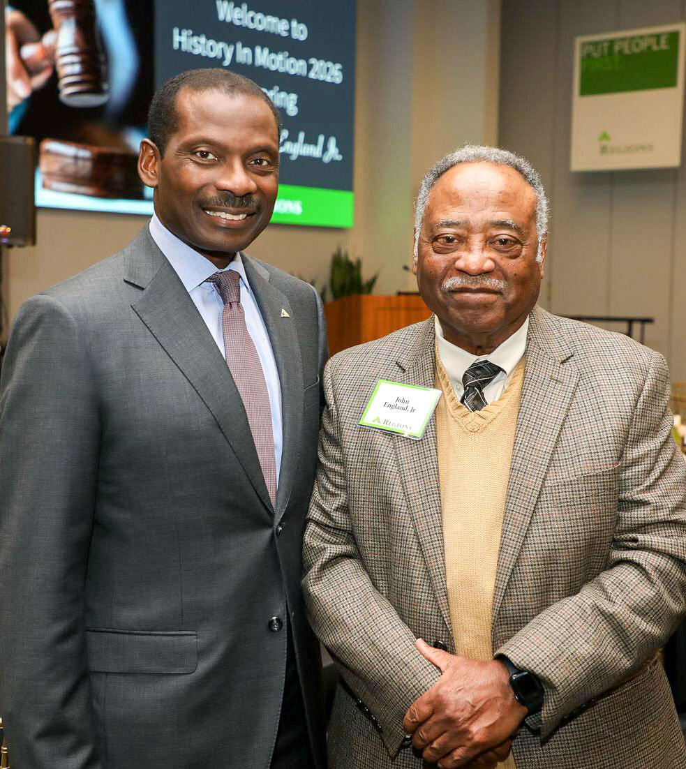 Leroy Abrahams, head of Community Engagement at Regions and Judge John England, Jr..