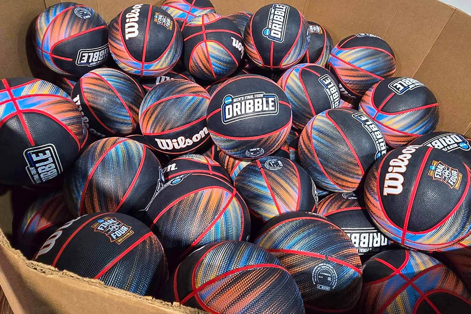 Wilson basketballs prepared for recycling and donation to Teachers’ Treasures, a longtime Regions Bank community partner supporting under‑resourced classrooms in Indianapolis.