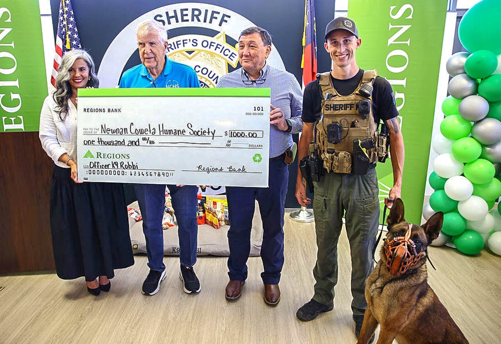 Regions Bank presenting check to Newnan Coweta Humane Society.