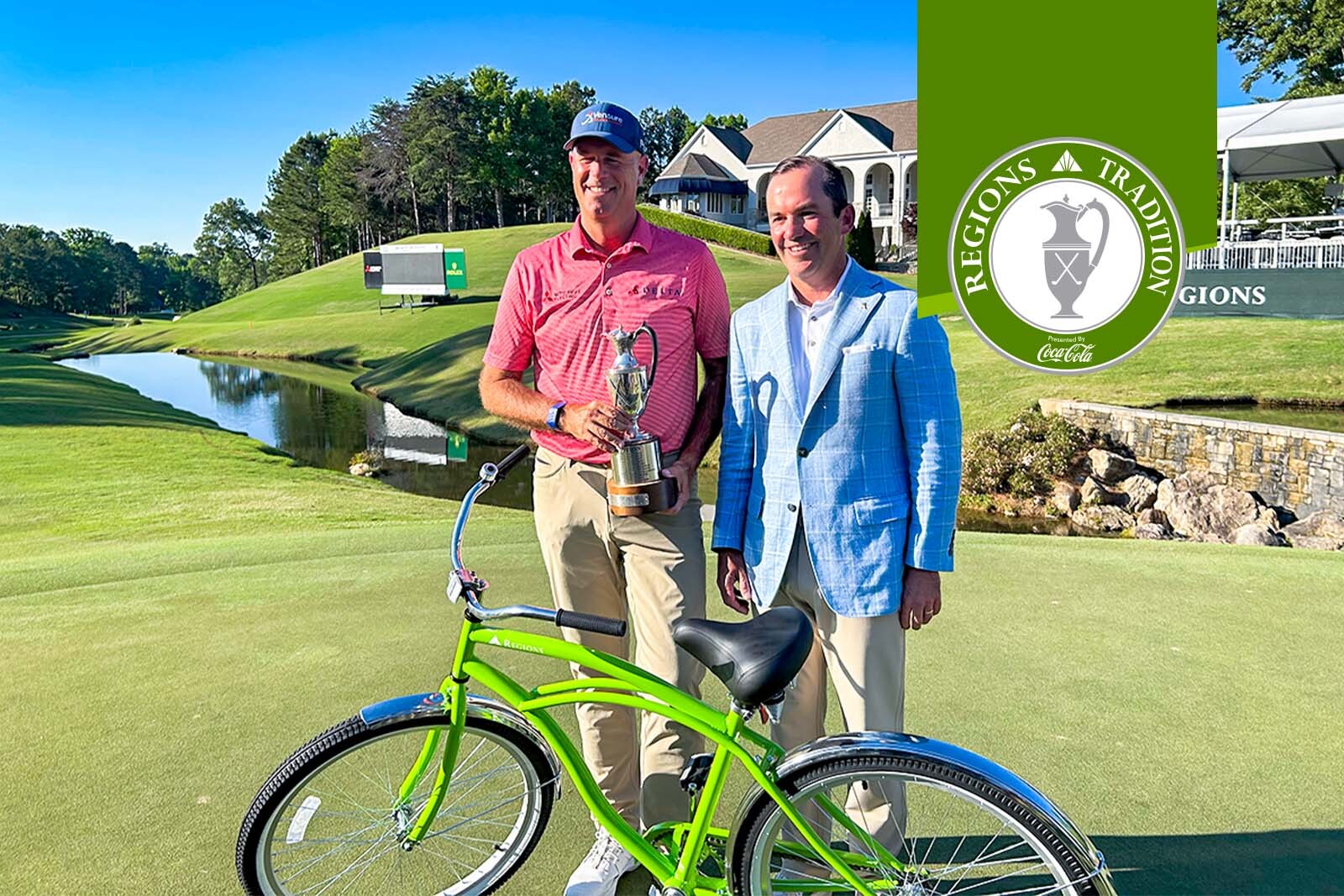 Christian White and Stewart Cink holding trophy at Regions Tradition...