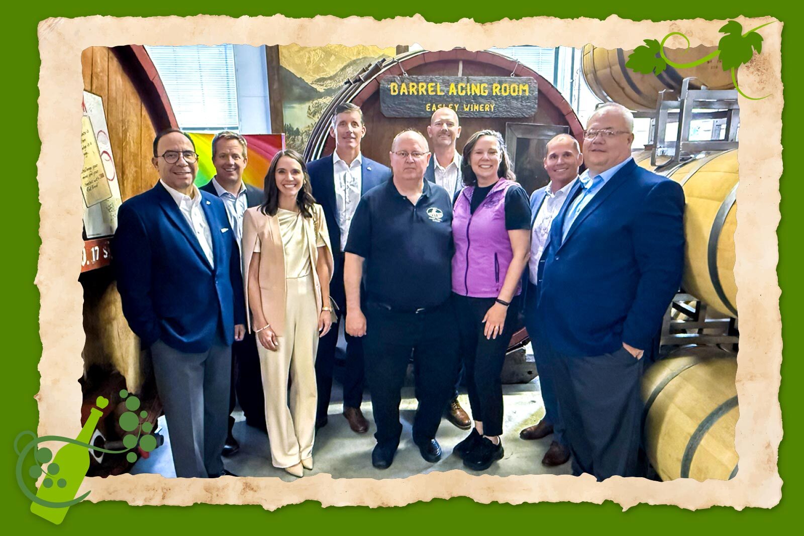 Regions Bank associates and Easley Winery owners in barrel aging...