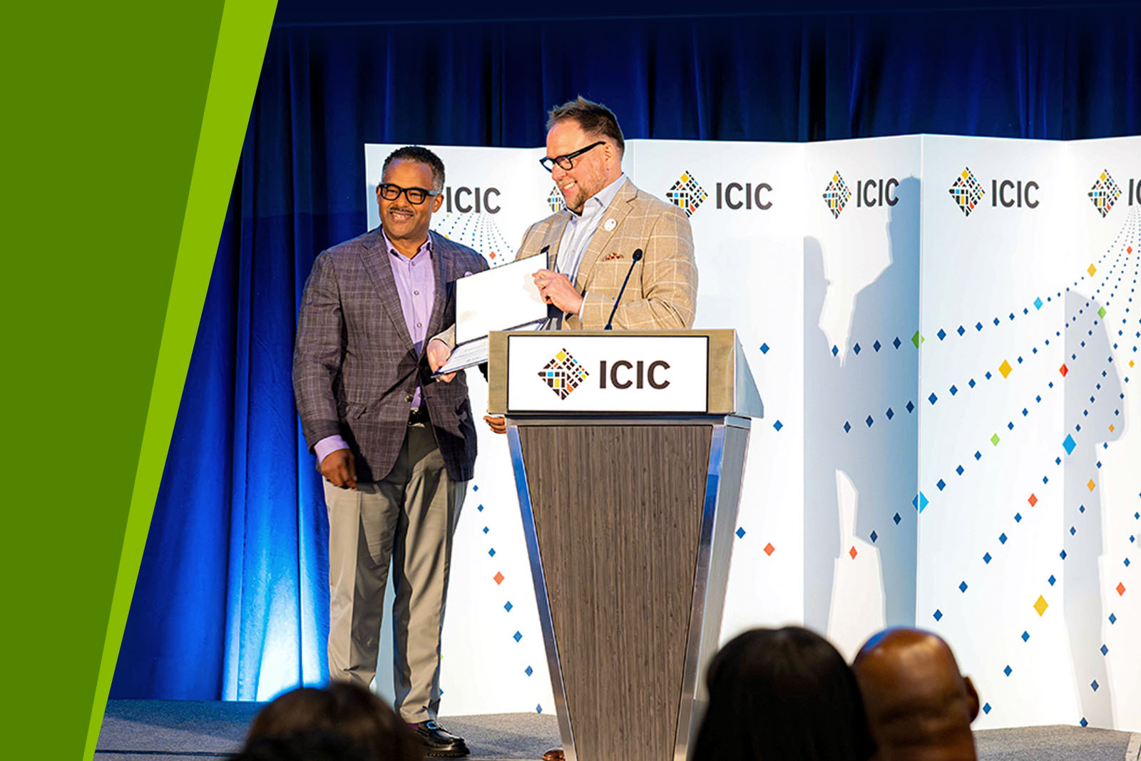 Michael Hooks Jr at ICIC Annual Conference with award.