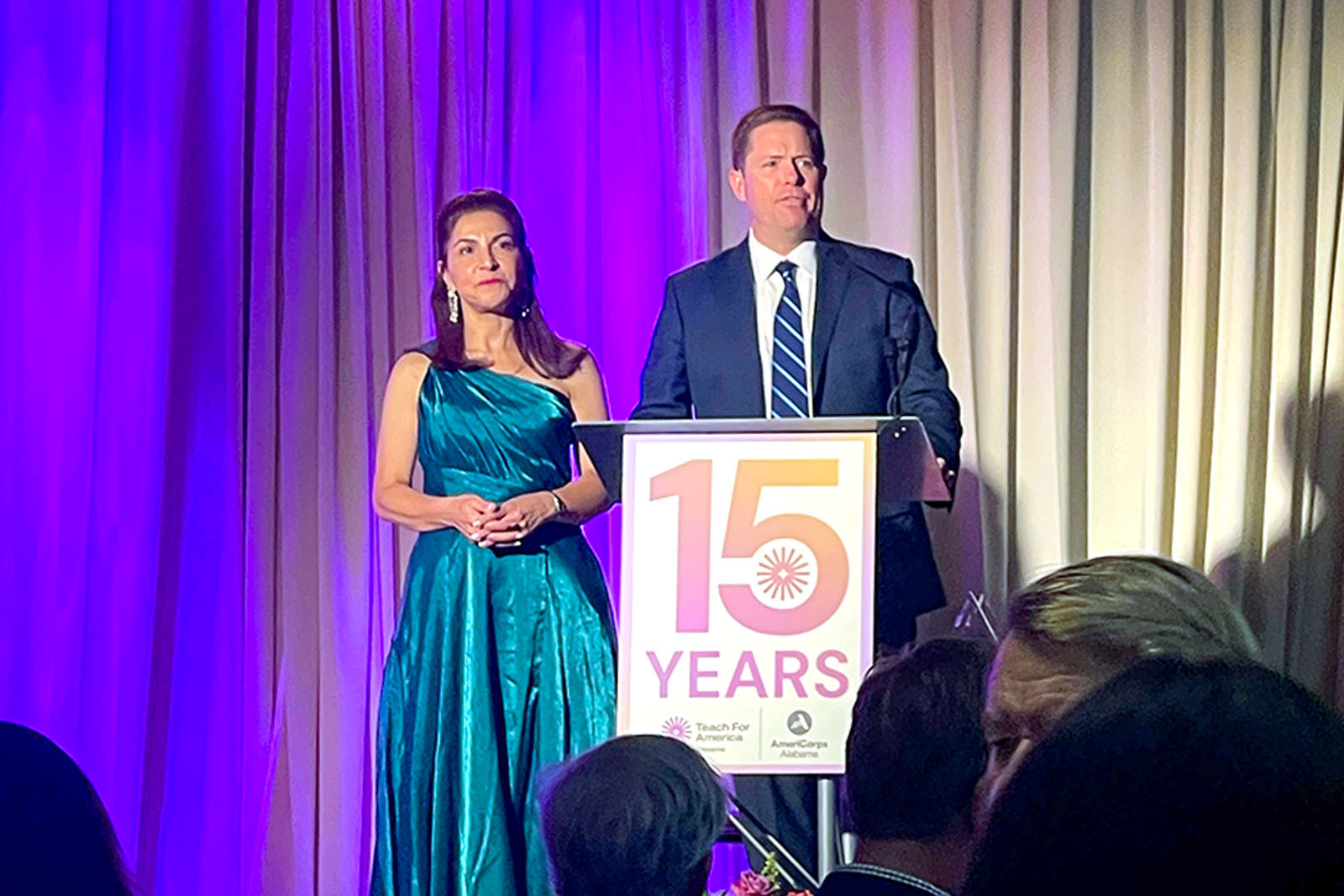 Marta Self and Tom Speir speaking at 15-Year Celebration of Teach for America (TFA) Alabama.