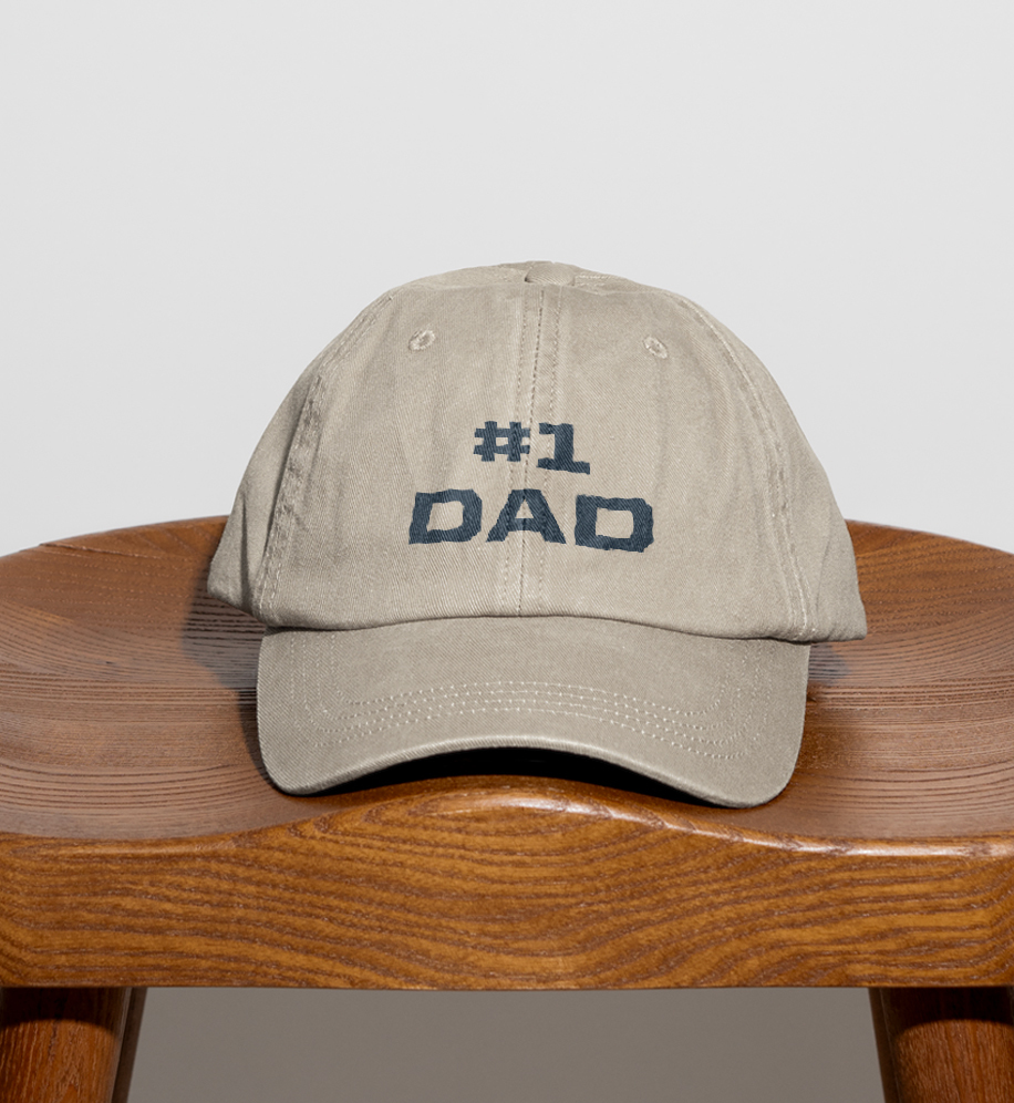 #1 dad hat sitting on stool.