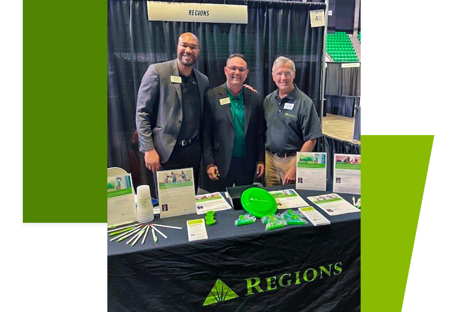 Regions associates in front of table with Regions branded giveaways at HomeWise Expo.