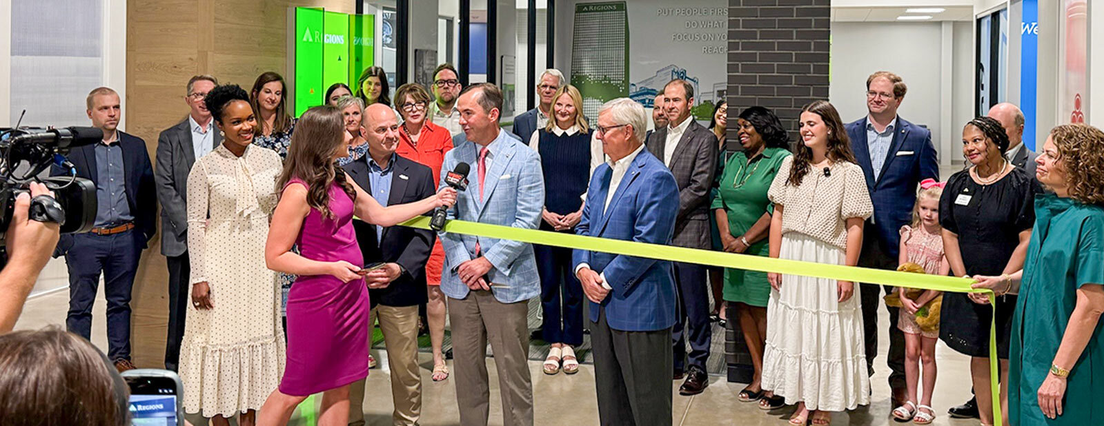 Live Ribbon Cutting.