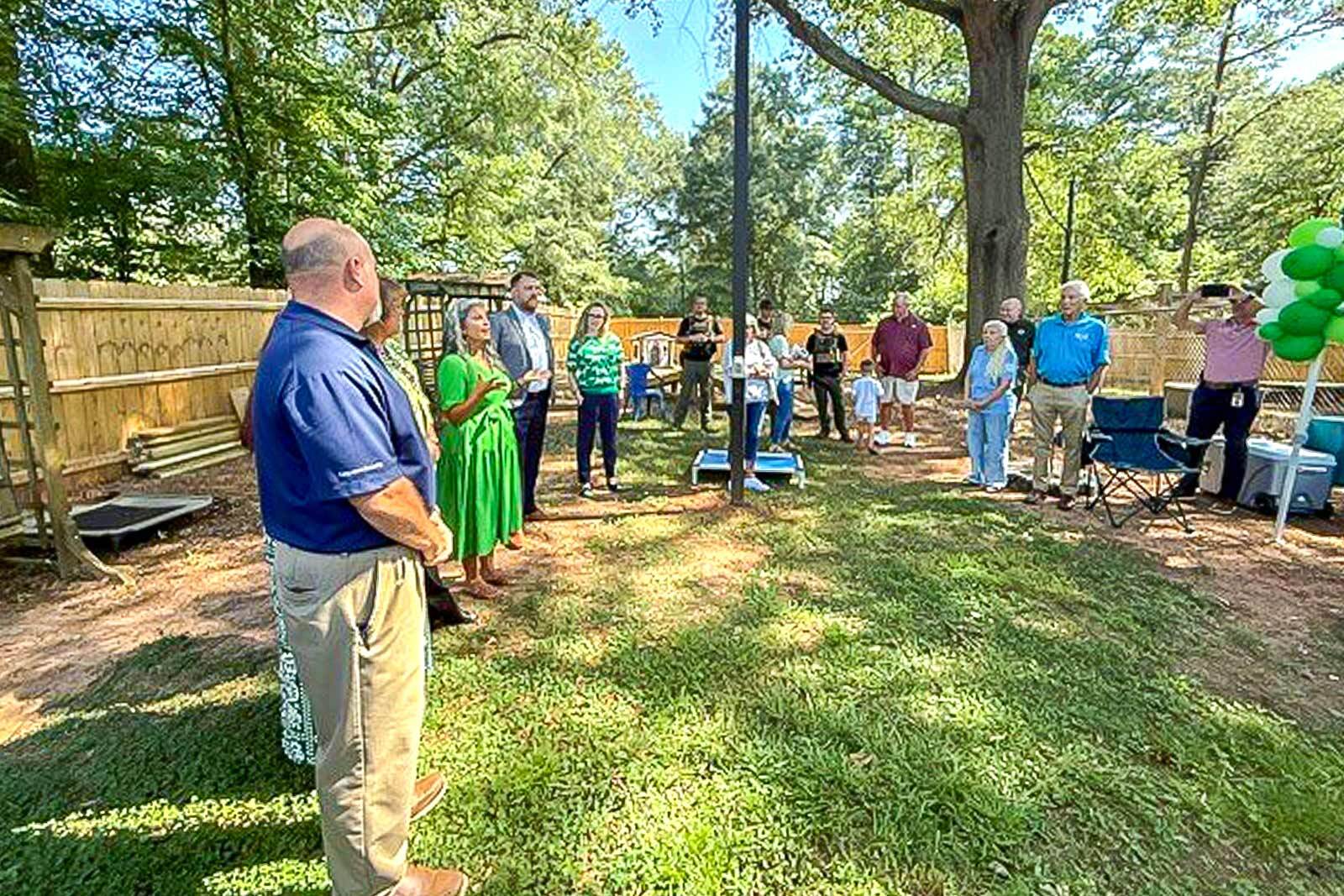 Regions Bank, the Newnan-Coweta Humane Society and community leaders gathered recently to dedicate exercise yards in memory of K-9 Robbi.