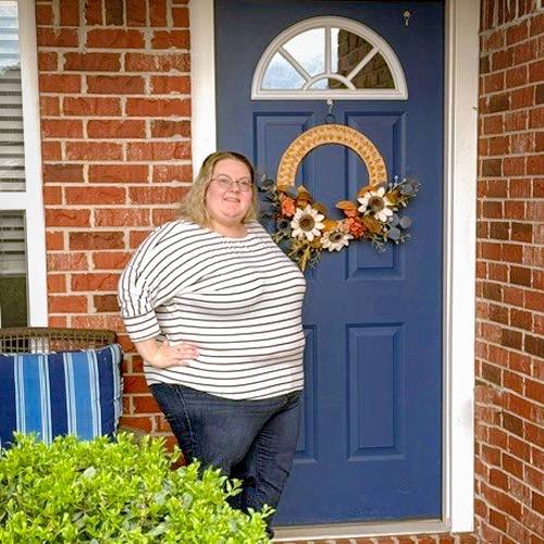 Nicole Dooley at her front door.