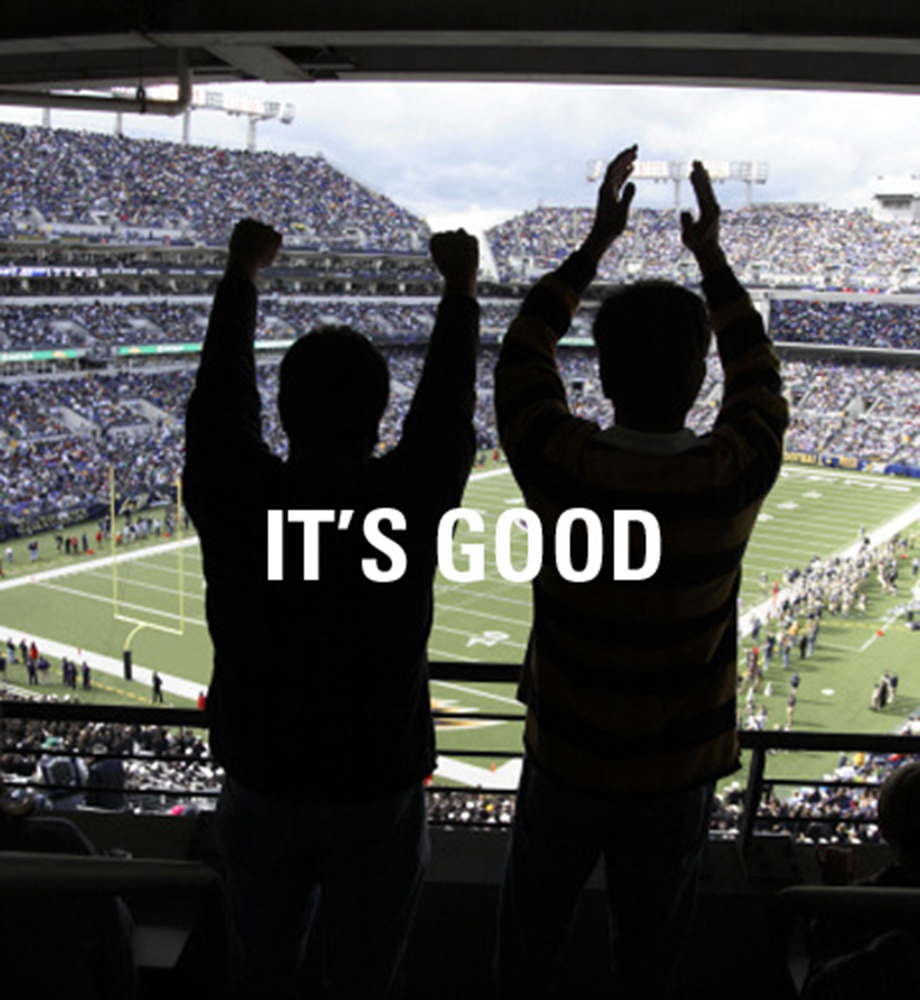 Silhouette of fans cheering at football game. Text: It's good.