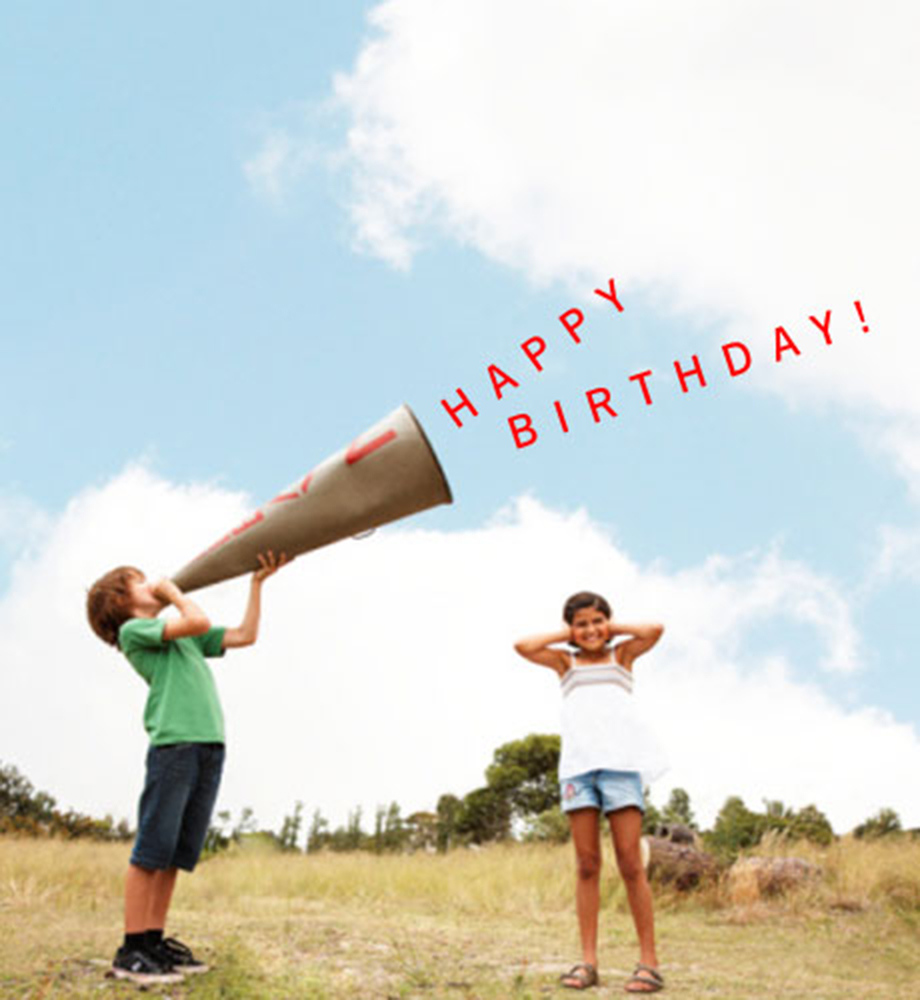 Child yelling into megaphone while another child covers ears. Text: Happy Birthday.