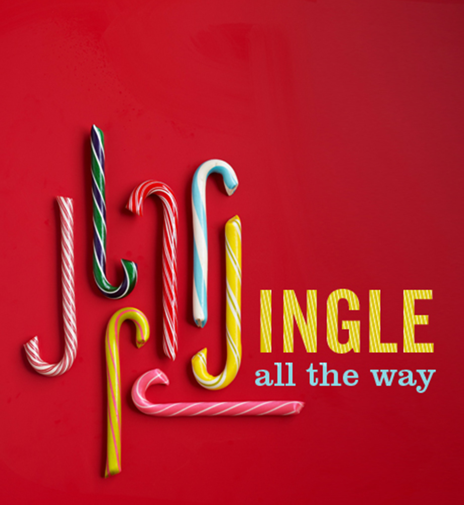Colorful candy canes. Text: Jingle all the way.
