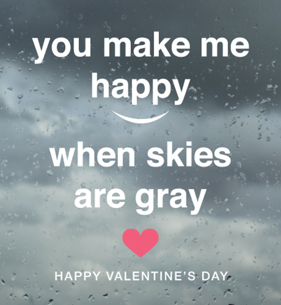 Stormy sky through window with raindrops. Text: You make me happy when skies are gray. Happy Valentine's Day.